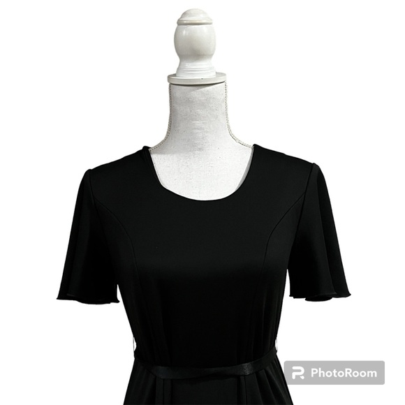 Elegant Choir modest floorlength gown with flowy bell sleeves and ribbon - Picture 2 of 15